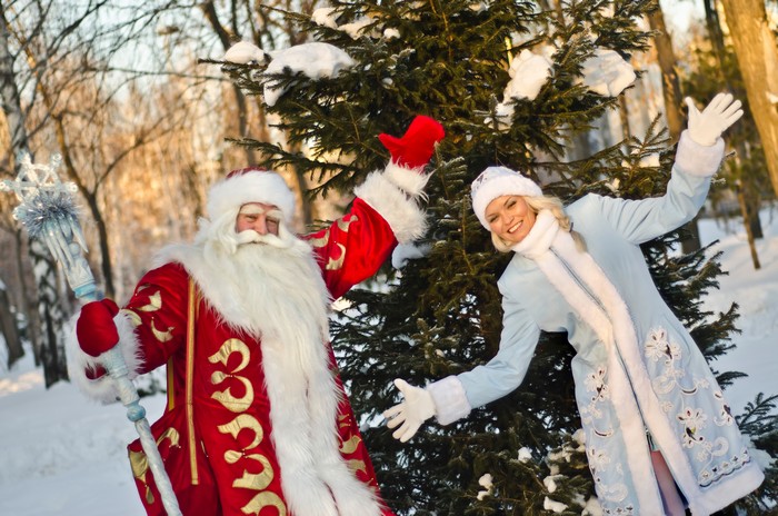Russian Christmas characters Ded Moroz (Father Frost) and Snegurochka (Snow Maiden) with gifts bag shutterstock_120397105.jpg